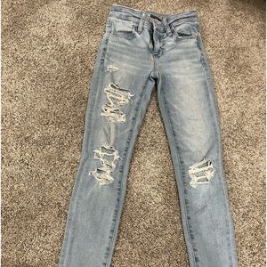 Light blue ripped skinny jeans